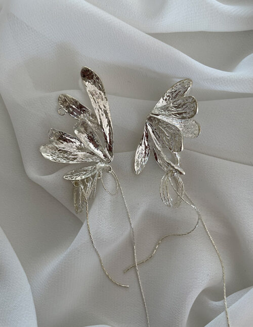 Aretes con alas